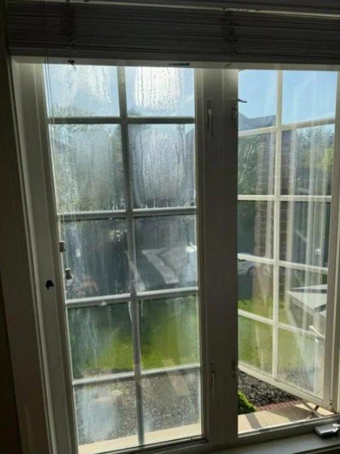 Foggy casement window — before